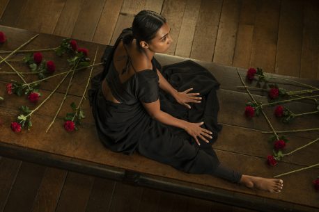 woman sitting on a table